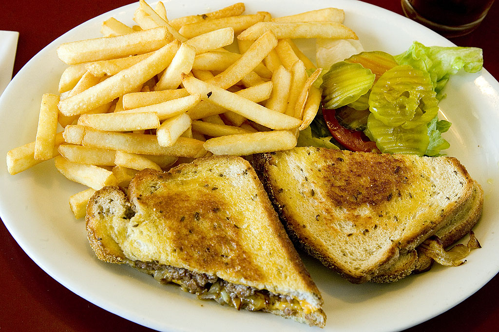Patty melt sandwich at a family restaurant that can work for a game day spread